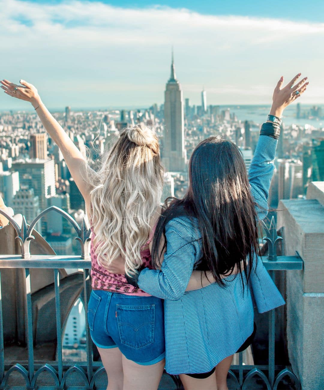 Want to become an au pair and have adventures of a lifetime such as these two girls waving to the world as they make friendships