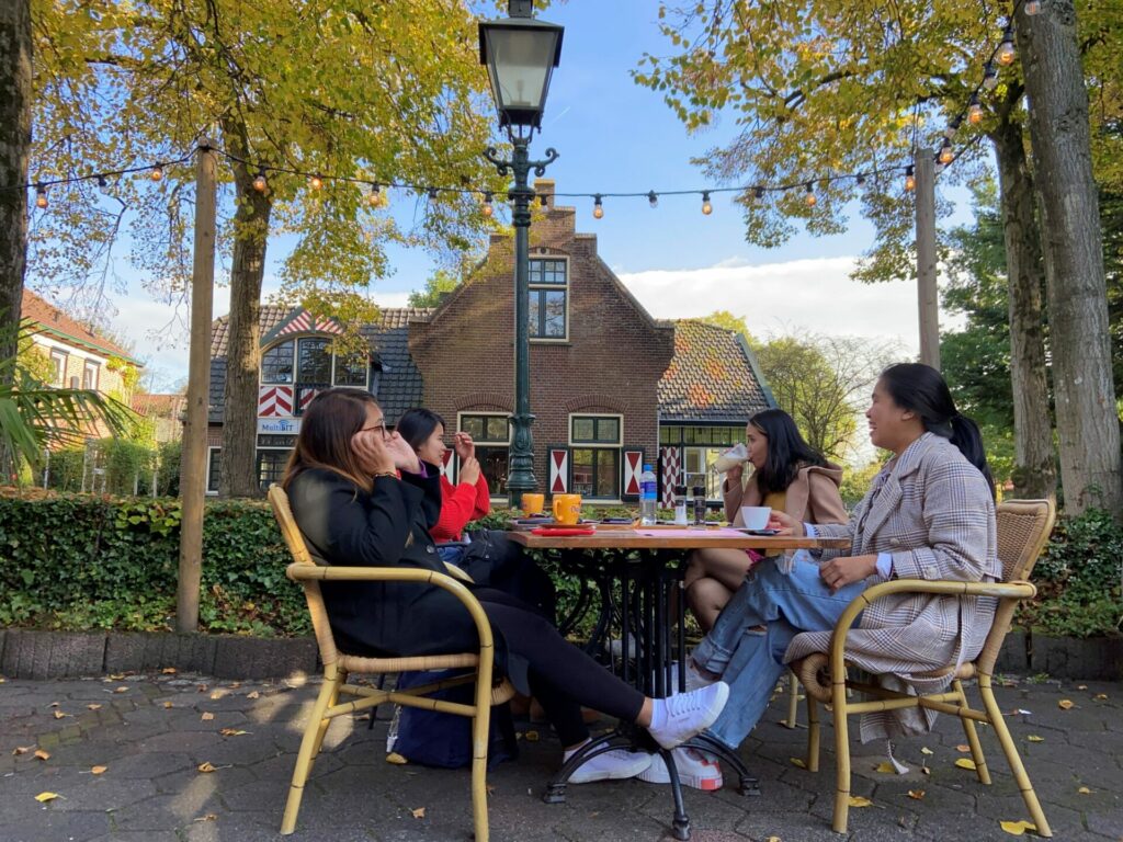 au pair dawn in the netherlands having a meal with other au pair friends