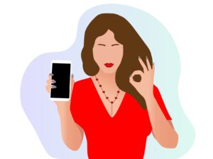 moeder met een telefoon in haar hand die laat zoen hoe makkelijk het betalingen via de nina.care app is