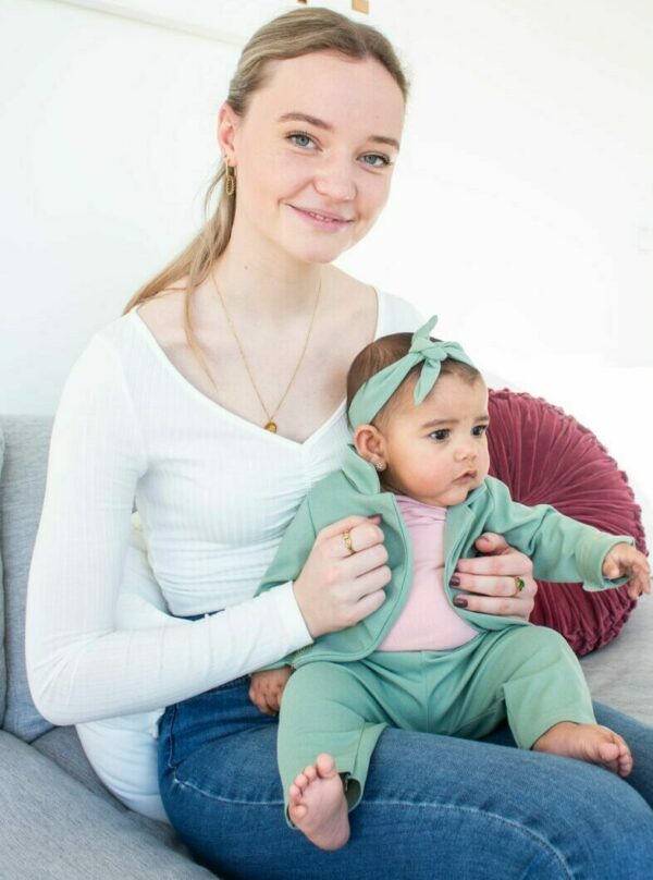 help with au pair babysitter page where you can learn more about our babysitters and our babysitting product look at this lovely babysitter with a cute baby on her lap